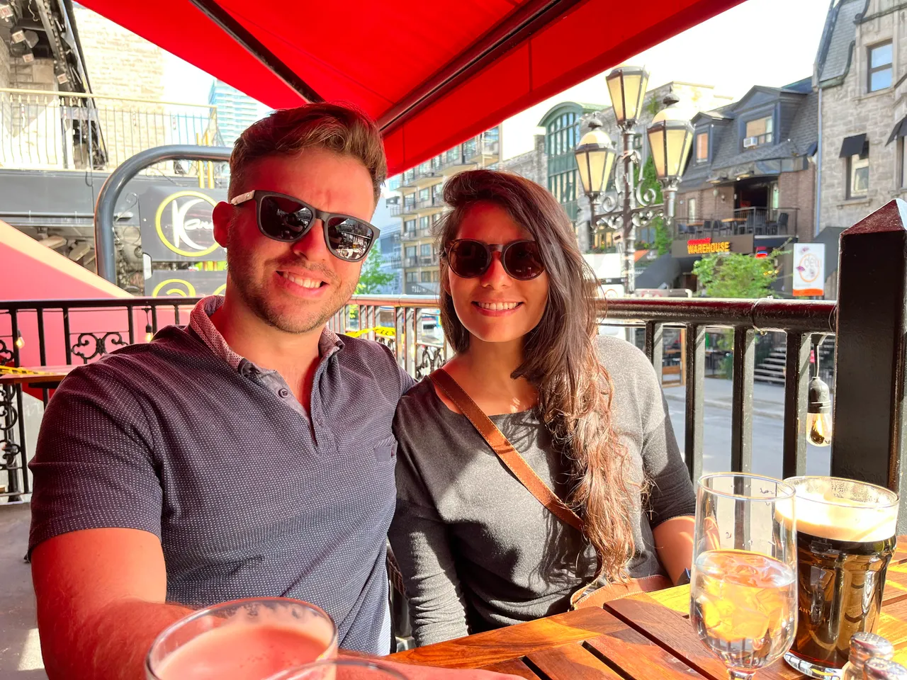 Patrick and his wife at an outdoor cafe in Montreal.